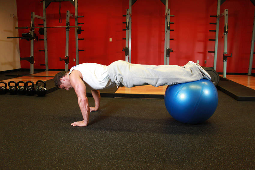Push-Ups With Feet On An Exercise Ball